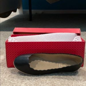 Black leather low tops